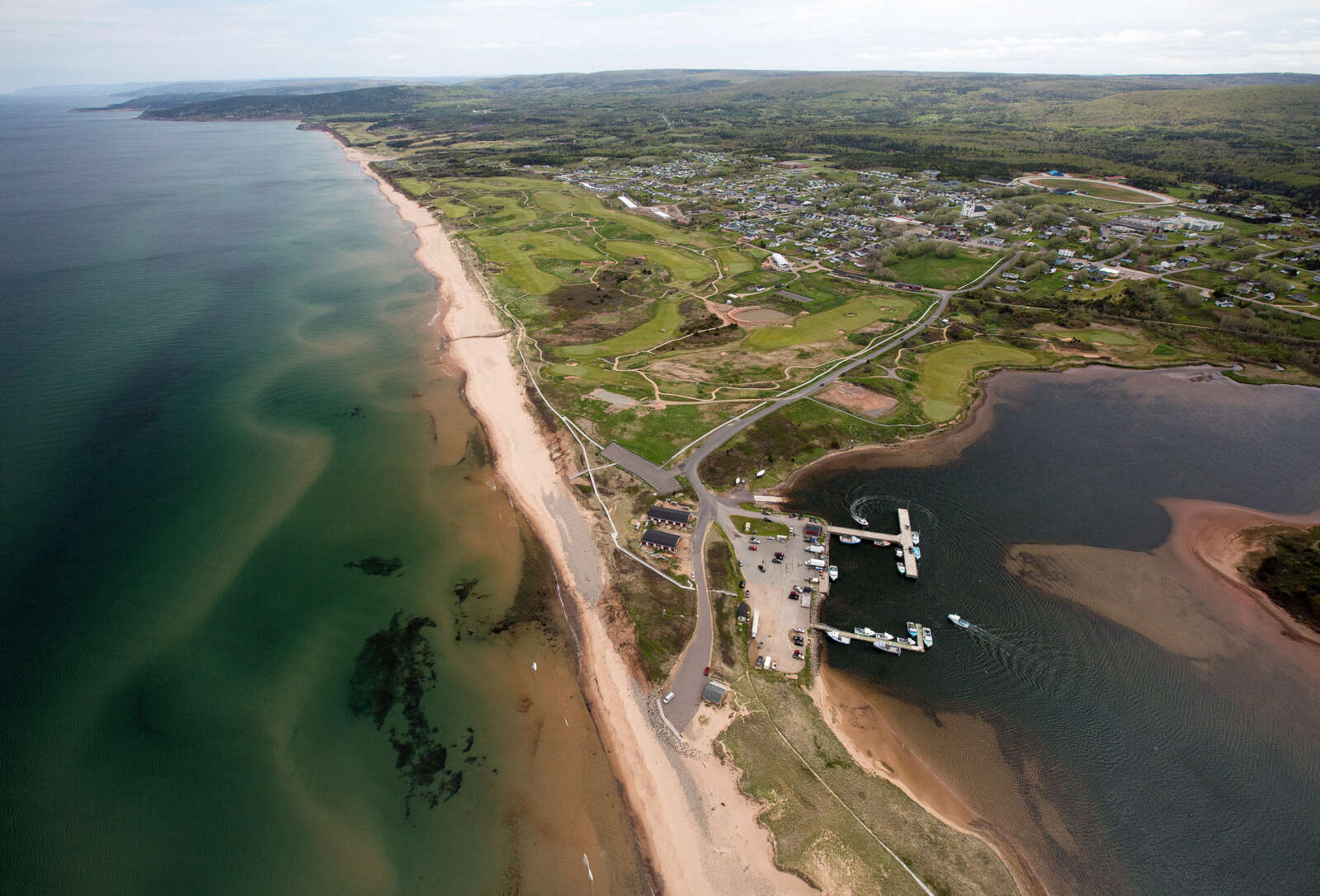 Aerial photo of golf course, beach and ocean